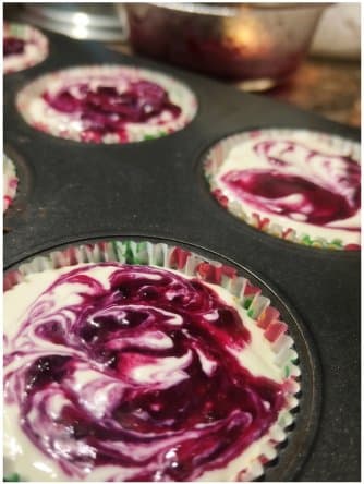 Blueberry cheesecake swirl going into the tin
